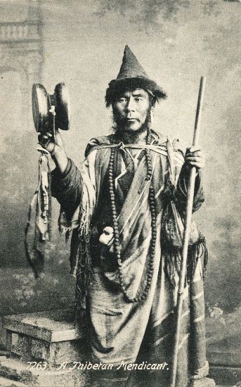an old postcard image of a Tibetan wandering yogi with a pointy hat